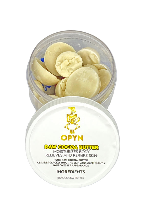 Open container of CYPN Raw Cocoa Butter on a white background